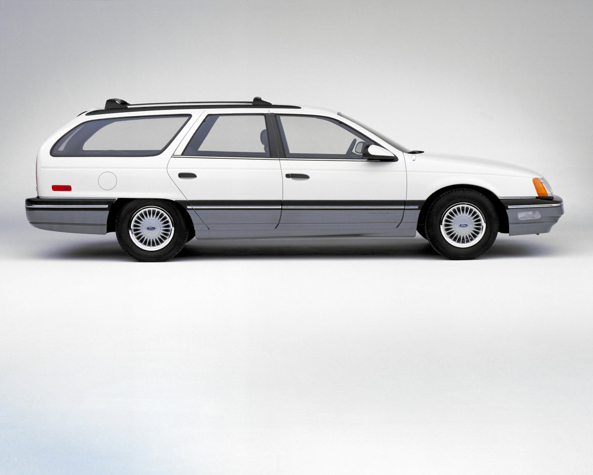This archival image documents the 1986 Ford Taurus station wagon and is preserved in the Ford Heritage Vault as part of Ford Motor Company's historic photographic archive. Free for personal, non-commercial use. Ford Heritage Vault reference AR-200...