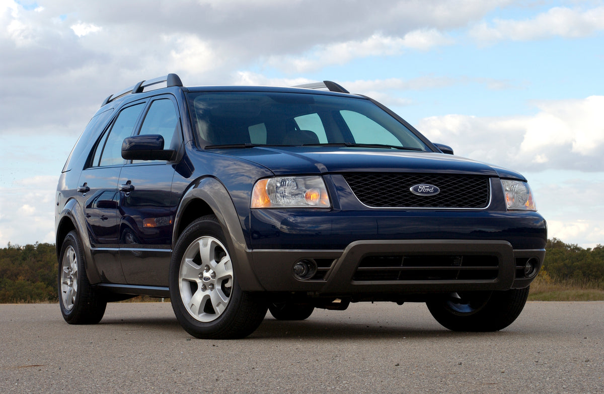 This archival image documents the 2005 Ford Freestyle on scenic road and is preserved in the Ford Heritage Vault as part of Ford Motor Company's historic photographic archive. Free for personal, non-commercial use. Ford Heritage Vault reference AR...