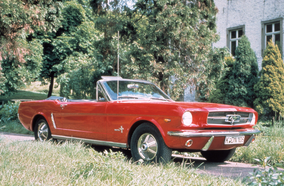 This archival image documents the 1965 Ford Mustang closeup on scenic road with trees and is preserved in the Ford Heritage Vault as part of Ford Motor Company's historic photographic archive. Free for personal, non-commercial use. Ford Heritage V...