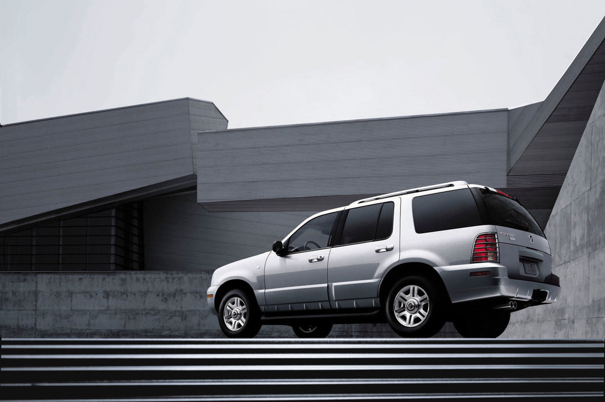 This archival image documents the 2003 Mercury Mountaineer rear angle in industrial landscape CN336030-002 and is preserved in the Ford Heritage Vault as part of Ford Motor Company's historic photographic archive. Free for personal, non-commercial...