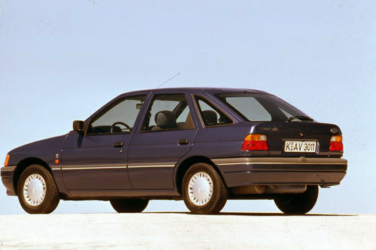 This archival image documents the 1990 Ford Escort CE-14 LHD on road in Spain and is preserved in the Ford Heritage Vault as part of Ford Motor Company's historic photographic archive. Free for personal, non-commercial use. Ford Heritage Vault ref...