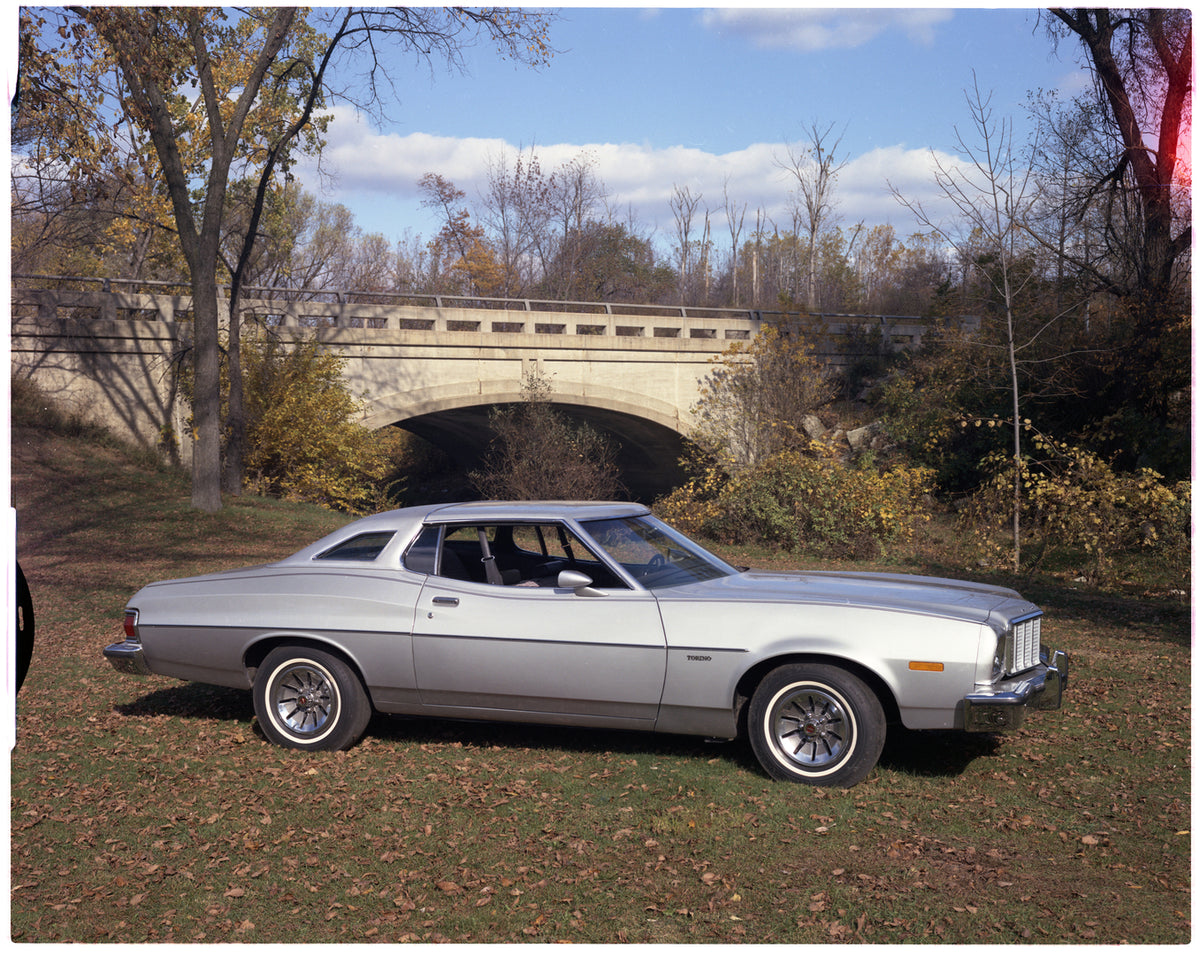 This archival image documents the 1976 Ford Torino two-door scenic and is preserved in the Ford Heritage Vault as part of Ford Motor Company's historic photographic archive. Free for personal, non-commercial use. Ford Heritage Vault reference AR-2...