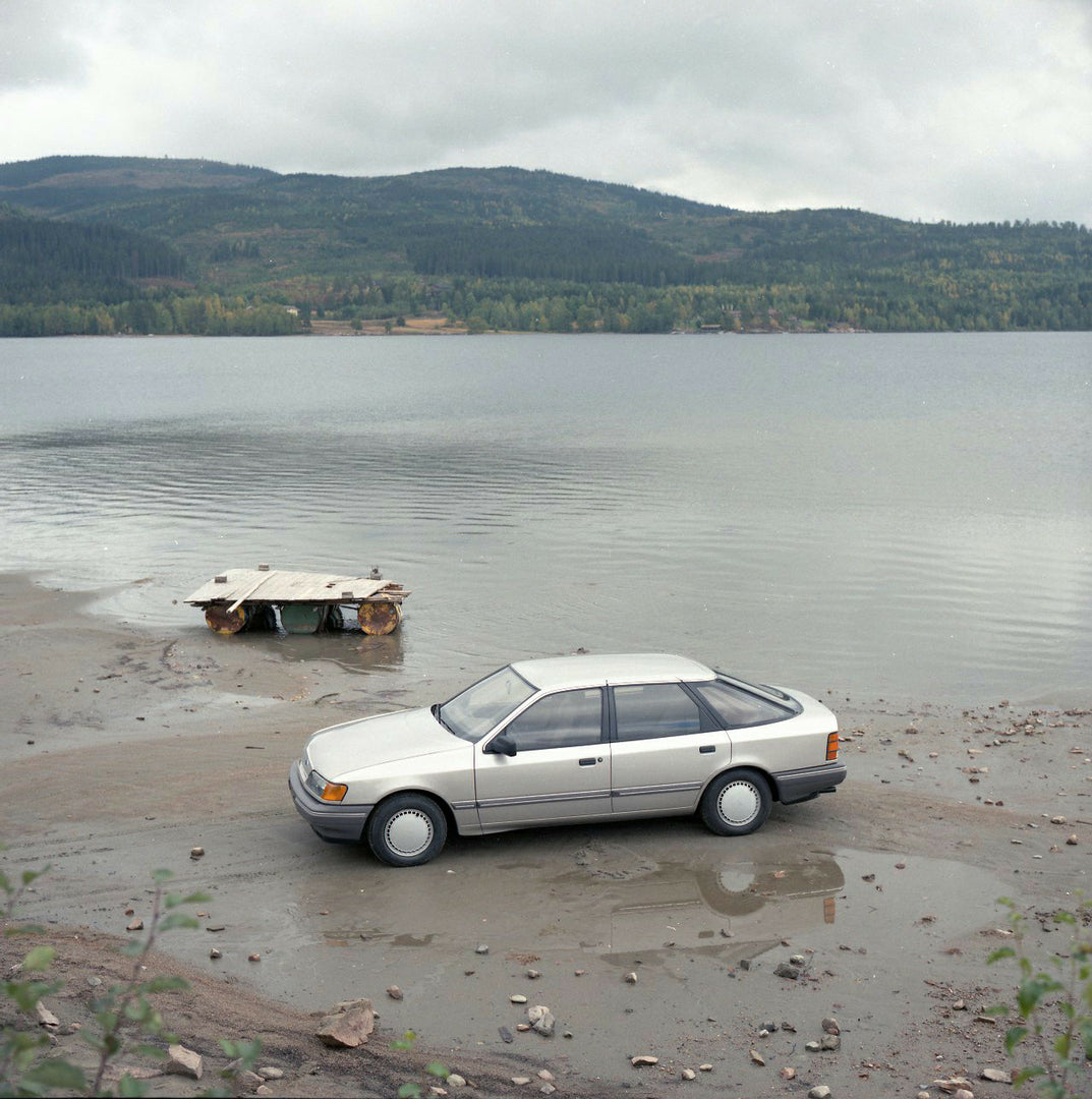 This archival image documents the 1984 Ford Scorpio Mark I CL aerial view on scenic beach in Norway and is preserved in the Ford Heritage Vault as part of Ford Motor Company's historic photographic archive. Free for personal, non-commercial use. F...