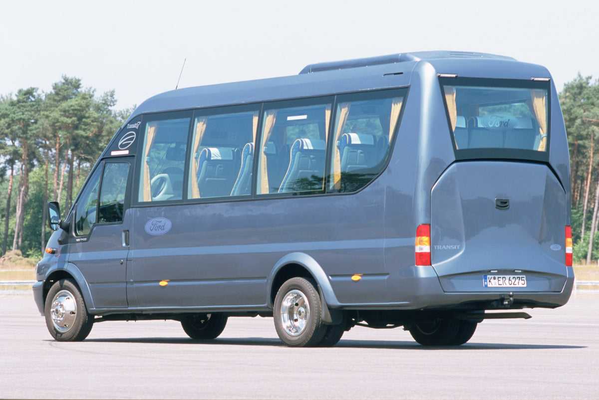 This archival image documents the 2003 Ford Transit Bonito Mark IV 17 Seat Bus Conversion rear view in scenic parking lot and is preserved in the Ford Heritage Vault as part of Ford Motor Company's historic photographic archive. Free for personal,...