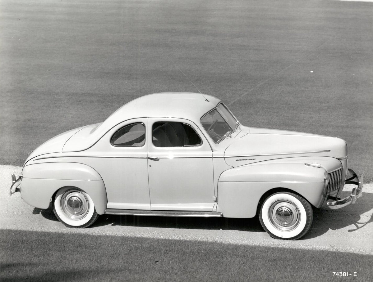 This archival image documents the 1941 Mercury coupe side view and is preserved in the Ford Heritage Vault as part of Ford Motor Company's historic photographic archive. Free for personal, non-commercial use. Ford Heritage Vault reference AR-2008-...