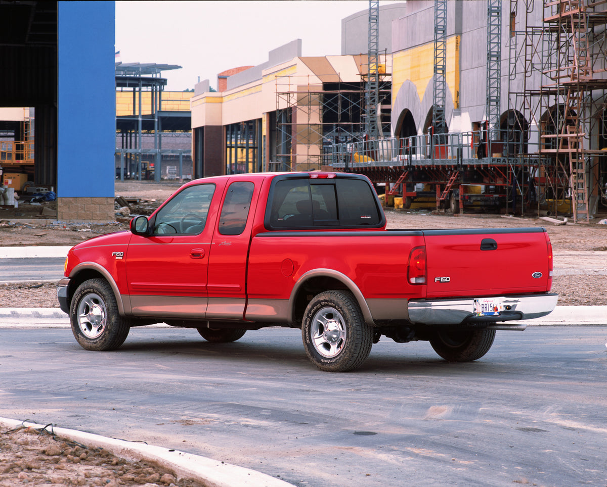 This archival image documents the 2002 Ford F-150 pickup truck on construction site and is preserved in the Ford Heritage Vault as part of Ford Motor Company's historic photographic archive. Free for personal, non-commercial use. Ford Heritage Vau...