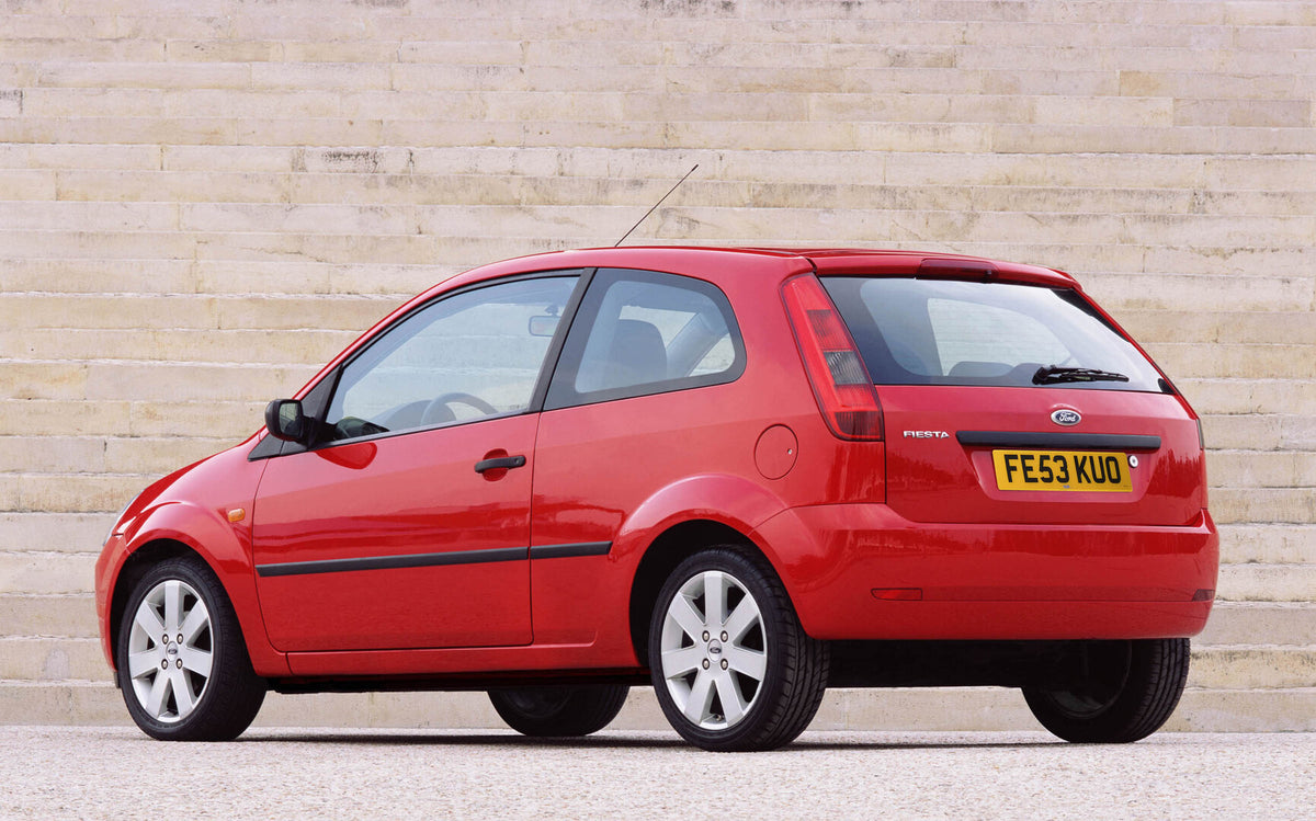 This archival image documents the 2003 Ford Fiesta Mark VI rear view in front of brick wall and is preserved in the Ford Heritage Vault as part of Ford Motor Company's historic photographic archive. Free for personal, non-commercial use. Ford Heri...