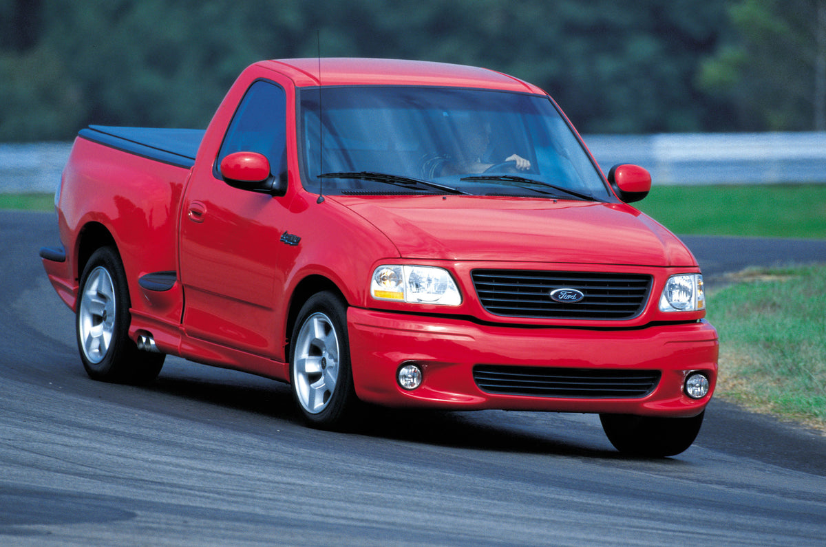 This archival image documents the 2001 Ford F-150 SVT Lightning pickup truck and is preserved in the Ford Heritage Vault as part of Ford Motor Company's historic photographic archive. Free for personal, non-commercial use. Ford Heritage Vault refe...