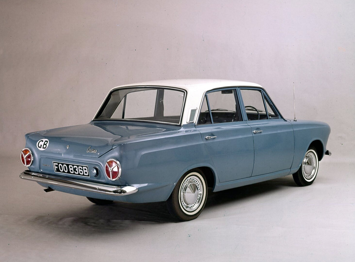 This archival image documents the 1965 Ford Cortina MK I Deluxe rear view in studio and is preserved in the Ford Heritage Vault as part of Ford Motor Company's historic photographic archive. Free for personal, non-commercial use. Ford Heritage Vau...