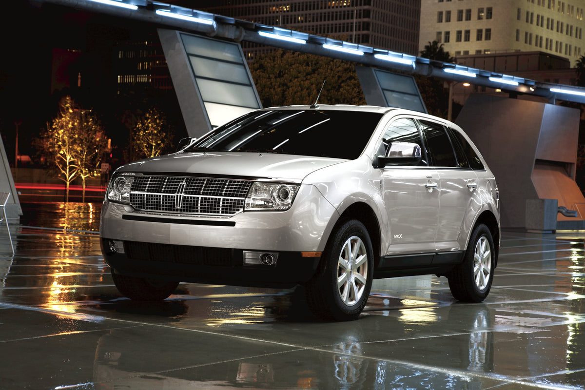 This archival image documents the 2010 Lincoln MKX on street at night MS87716 and is preserved in the Ford Heritage Vault as part of Ford Motor Company's historic photographic archive. Free for personal, non-commercial use. Ford Heritage Vault ref...