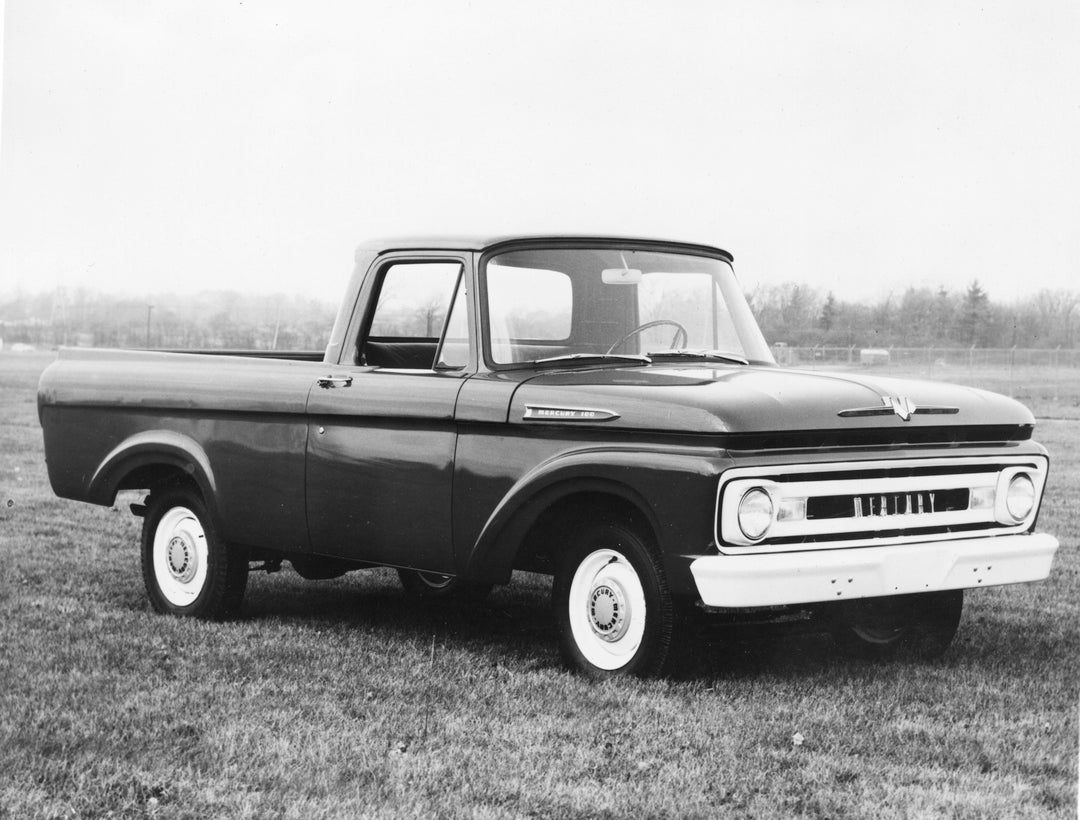 This archival image documents the 1961 Mercury M-100 in scenic field and is preserved in the Ford Heritage Vault as part of Ford Motor Company's historic photographic archive. Free for personal, non-commercial use. Ford Heritage Vault reference AR...