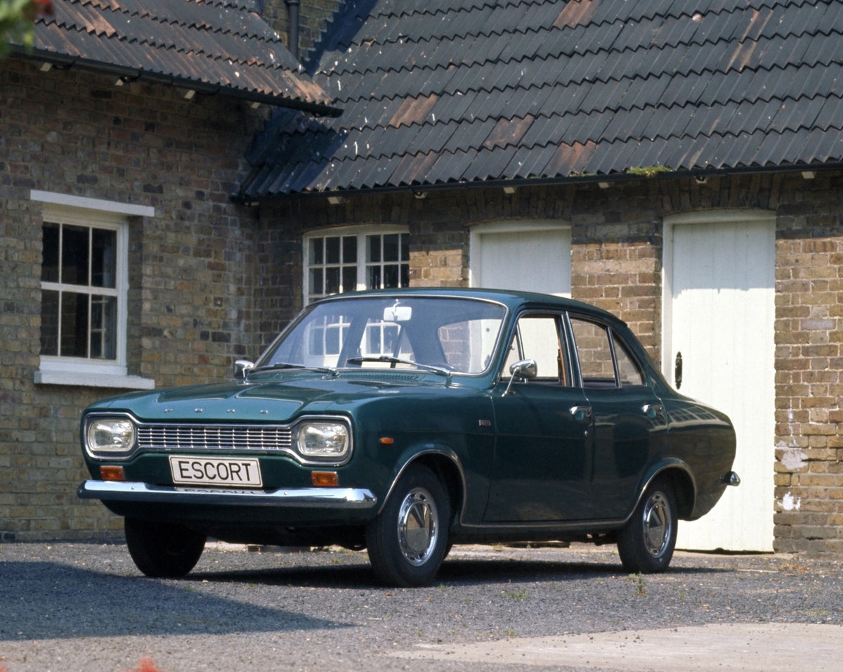 This archival image documents the 1970 Ford Escort Mark I in front of scenic house Escort-MK1-1970 and is preserved in the Ford Heritage Vault as part of Ford Motor Company's historic photographic archive. Free for personal, non-commercial use. Fo...