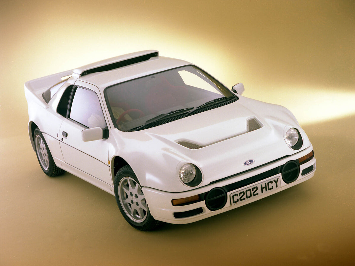 This archival image documents the 1985 Ford RS200 front 3/4 view in studio 1985-836-1 and is preserved in the Ford Heritage Vault as part of Ford Motor Company's historic photographic archive. Free for personal, non-commercial use. Ford Heritage V...