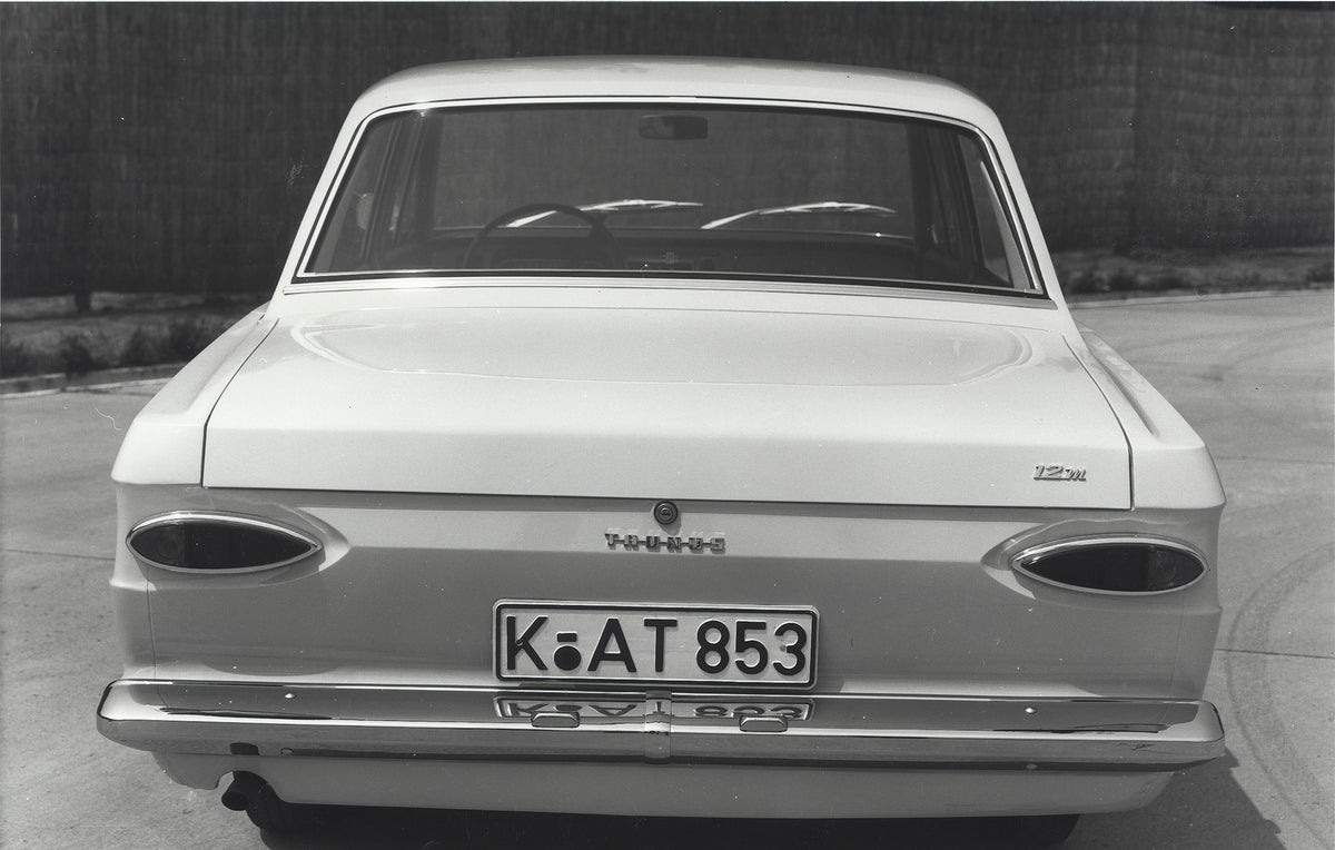 This archival image documents the 1966 Ford Taunus 12M P4 closeup rear view and is preserved in the Ford Heritage Vault as part of Ford Motor Company's historic photographic archive. Free for personal, non-commercial use. Ford Heritage Vault refer...