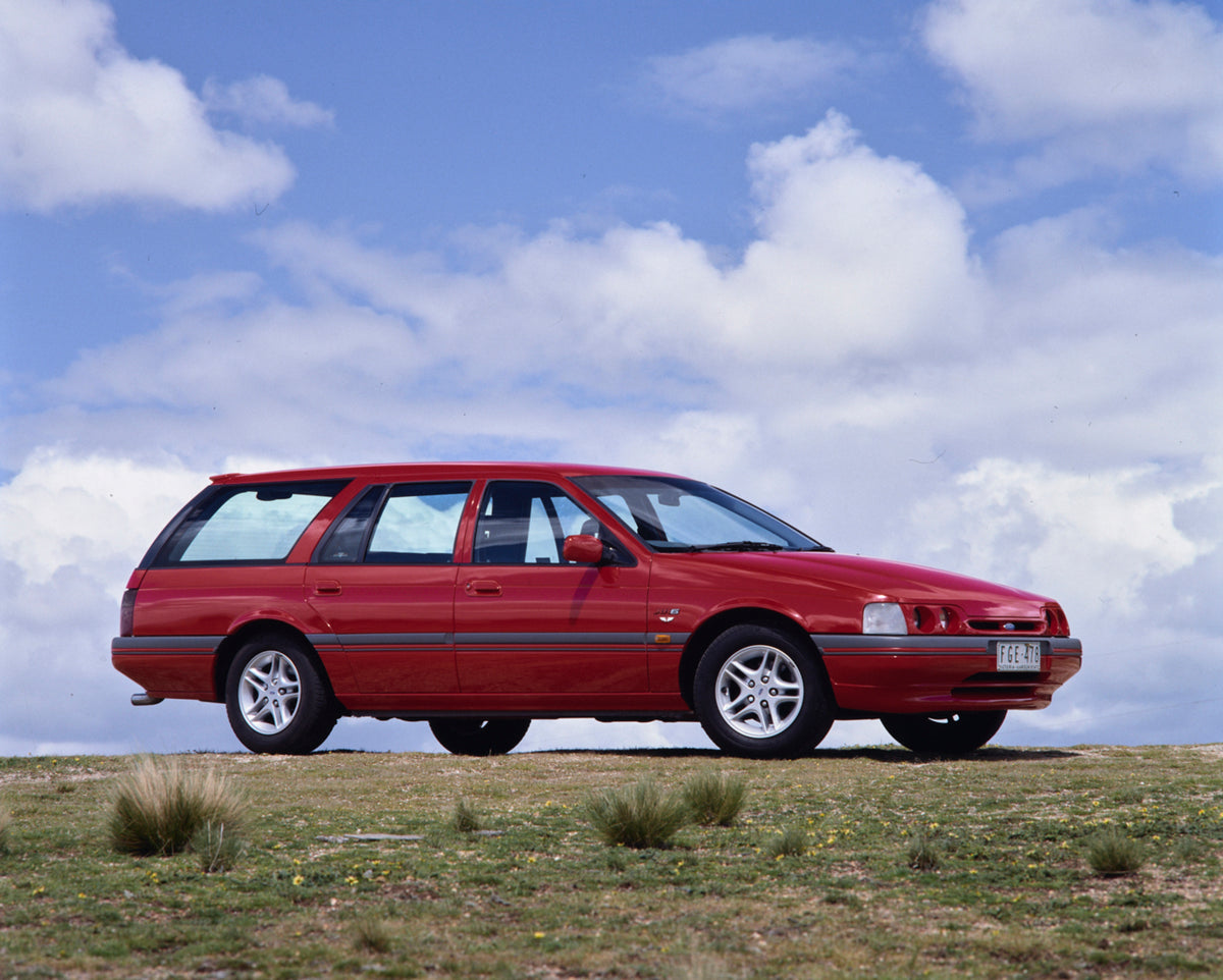 This archival image documents the 1993 Ford ED Falcon XR6 Station Wagon Driver Side Profile in a Field FAP-2011-3 and is preserved in the Ford Heritage Vault as part of Ford Motor Company's historic photographic archive. Free for personal, non-com...