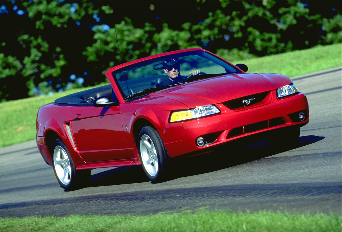 This archival image documents the 2001 Ford Mustang SVT Cobra convertible and is preserved in the Ford Heritage Vault as part of Ford Motor Company's historic photographic archive. Free for personal, non-commercial use. Ford Heritage Vault referen...