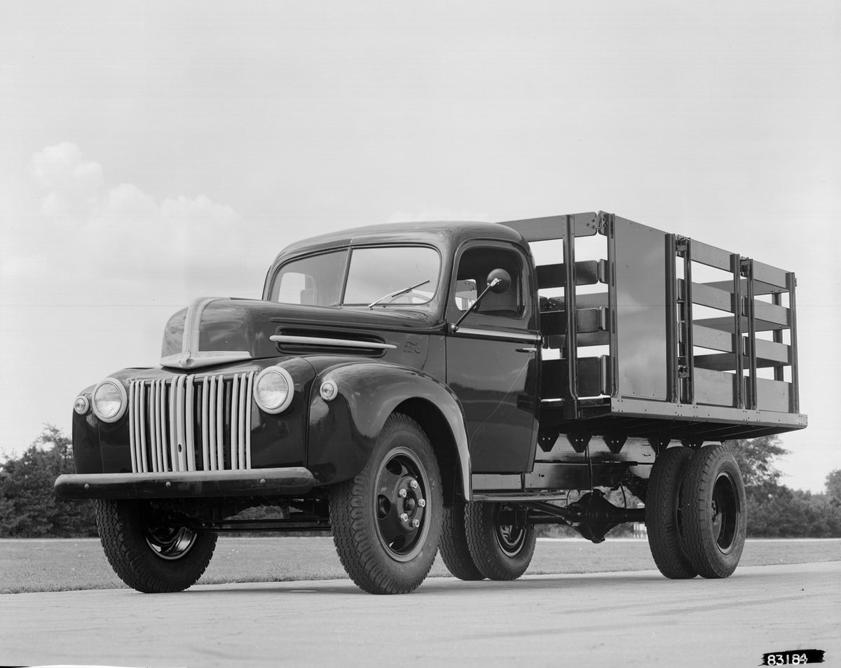 This archival image documents the 1946 Ford stake truck and is preserved in the Ford Heritage Vault as part of Ford Motor Company's historic photographic archive. Free for personal, non-commercial use. Ford Heritage Vault reference AR-2008-8.1.4.1...