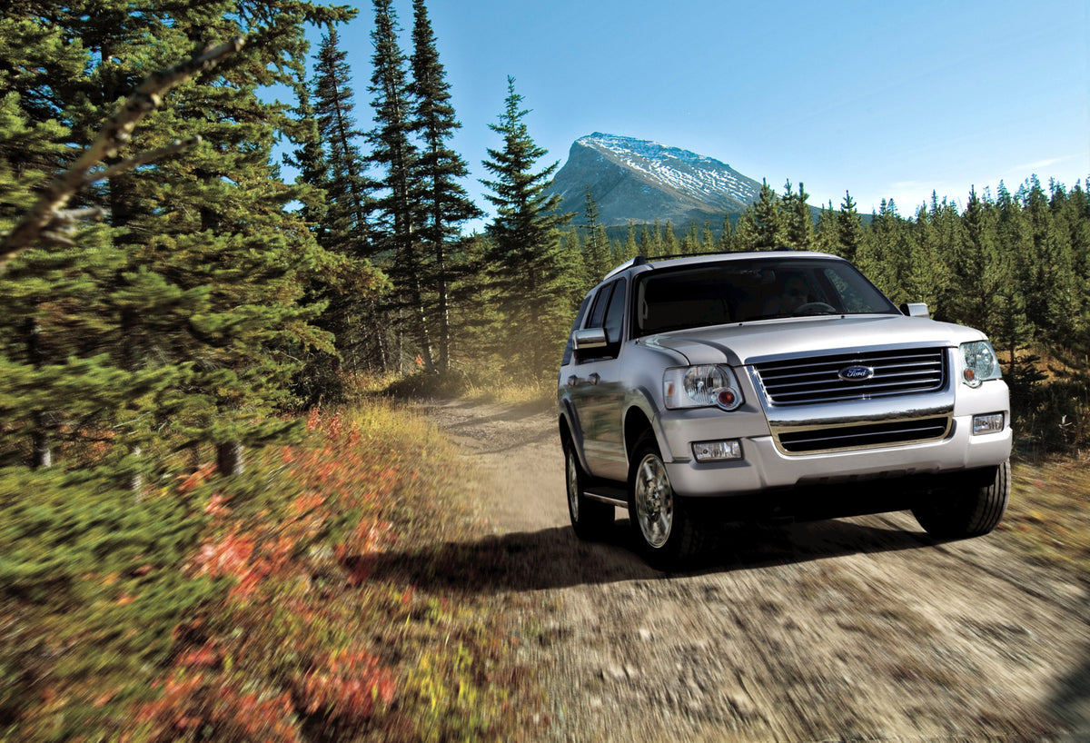 This archival image documents the 2009 Ford Explorer Limited action shot on scenic road MS4077 and is preserved in the Ford Heritage Vault as part of Ford Motor Company's historic photographic archive. Free for personal, non-commercial use. Ford H...