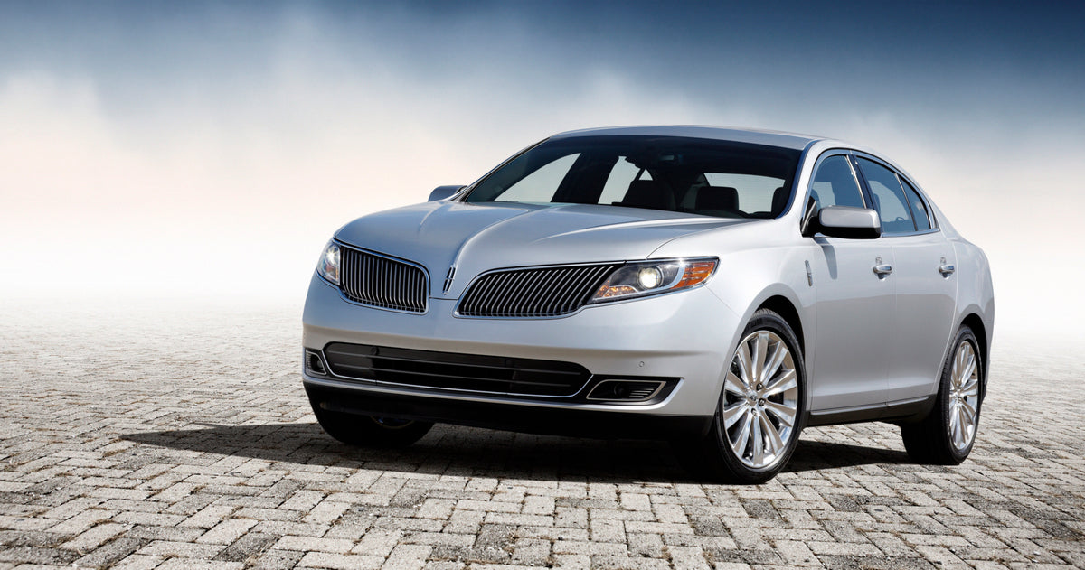 This archival image documents the 2013 Lincoln MKS with mist MS9529 and is preserved in the Ford Heritage Vault as part of Ford Motor Company's historic photographic archive. Free for personal, non-commercial use. Ford Heritage Vault reference AR-...