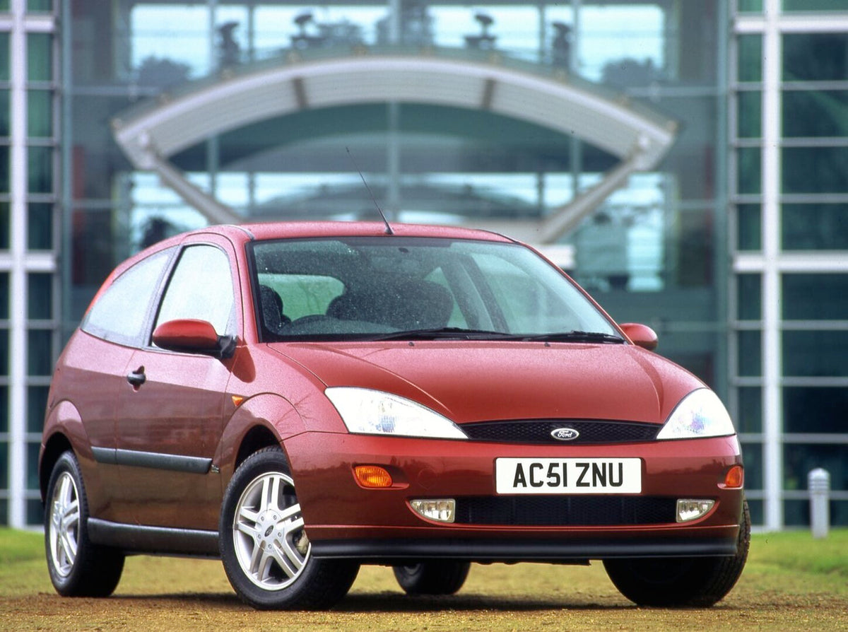 This archival image documents the 2001 Ford Focus Mark I Zetec closeup in front of scenic glass building and is preserved in the Ford Heritage Vault as part of Ford Motor Company's historic photographic archive. Free for personal, non-commercial u...