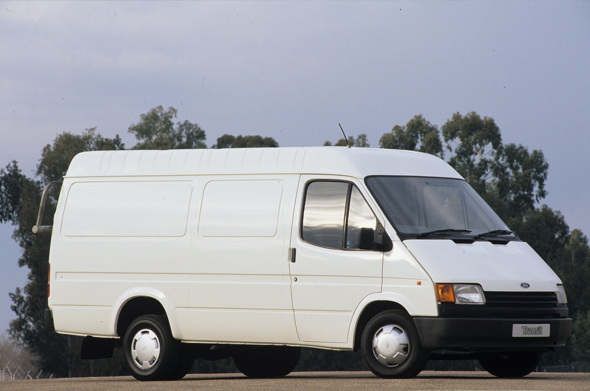 This archival image documents the 1986 Ford Transit Mark III with scenic trees and is preserved in the Ford Heritage Vault as part of Ford Motor Company's historic photographic archive. Free for personal, non-commercial use. Ford Heritage Vault re...