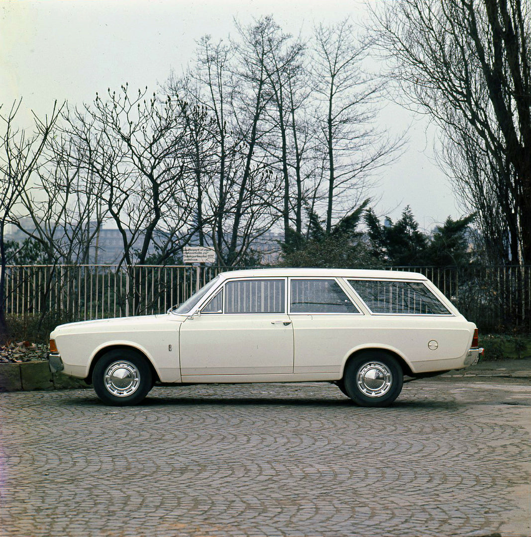 This archival image documents the 1971 Ford Taunus 20M side view with scenic trees and is preserved in the Ford Heritage Vault as part of Ford Motor Company's historic photographic archive. Free for personal, non-commercial use. Ford Heritage Vaul...