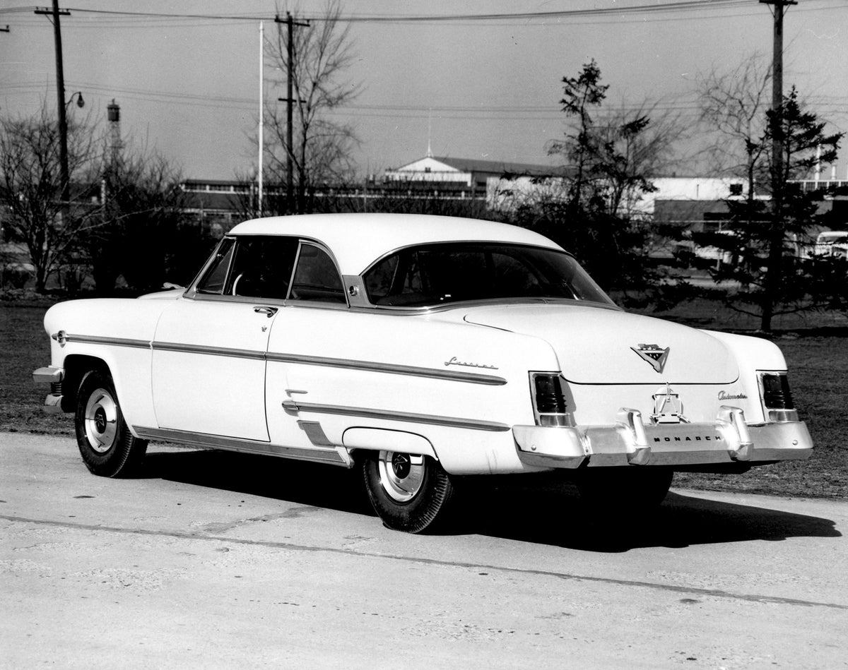 This archival image documents the 1954 Monarch Lucerne Coupe rear view on scenic road with trees AR-2007-5 and is preserved in the Ford Heritage Vault as part of Ford Motor Company's historic photographic archive. Free for personal, non-commercial...