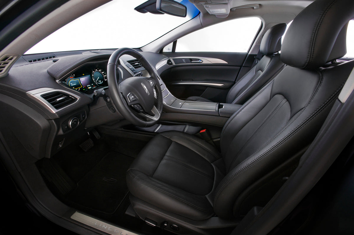 This archival image documents the 2013 Lincoln MKZ and is preserved in the Ford Heritage Vault as part of Ford Motor Company's historic photographic archive. Free for personal, non-commercial use. Ford Heritage Vault reference AR-2008-8.1.1.2270.