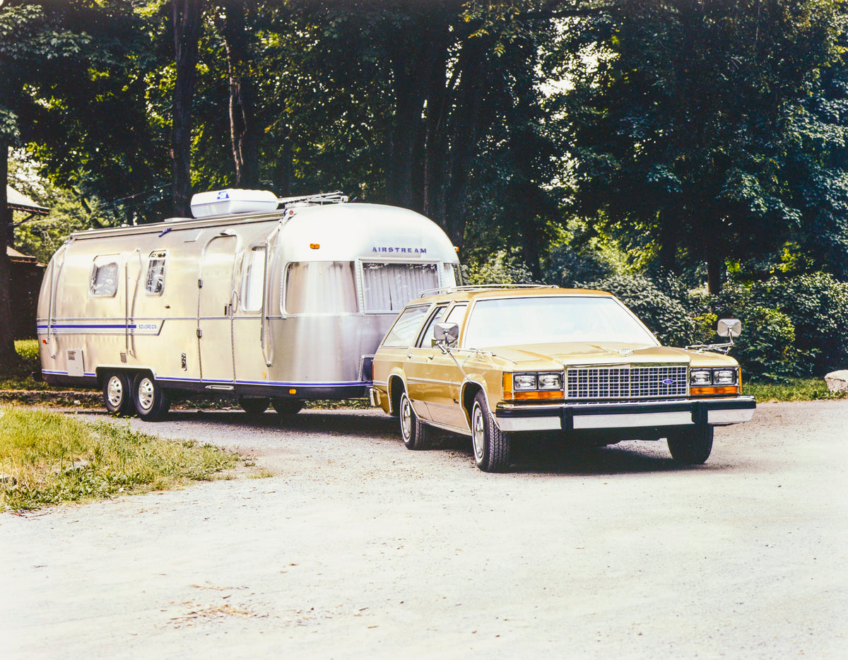 This archival image documents the 1985 Ford LTD Country Squire trailer towing package with camper and is preserved in the Ford Heritage Vault as part of Ford Motor Company's historic photographic archive. Free for personal, non-commercial use. For...