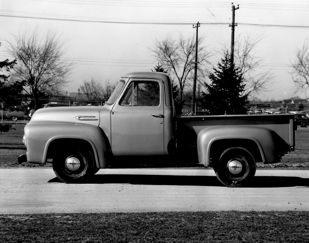 This archival image documents the 1954 Mercury M-100 Pickup side view on scenic road AR-2007-5 and is preserved in the Ford Heritage Vault as part of Ford Motor Company's historic photographic archive. Free for personal, non-commercial use. Ford H...