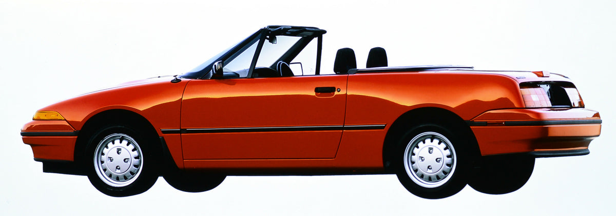 This archival image documents the 1991 Mercury Capri convertible and is preserved in the Ford Heritage Vault as part of Ford Motor Company's historic photographic archive. Free for personal, non-commercial use. Ford Heritage Vault reference AR-200...