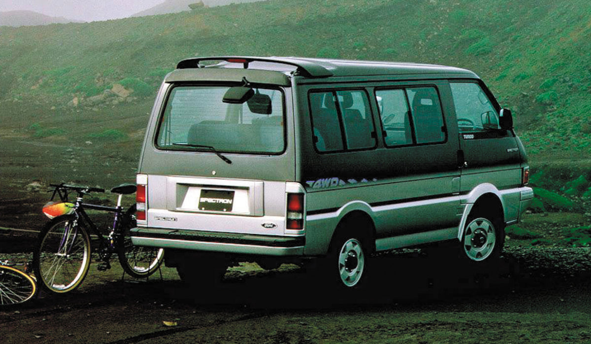 This archival image documents the 1999 Ford Spectron rear view in scenic mountains with bike and is preserved in the Ford Heritage Vault as part of Ford Motor Company's historic photographic archive. Free for personal, non-commercial use. Ford Her...