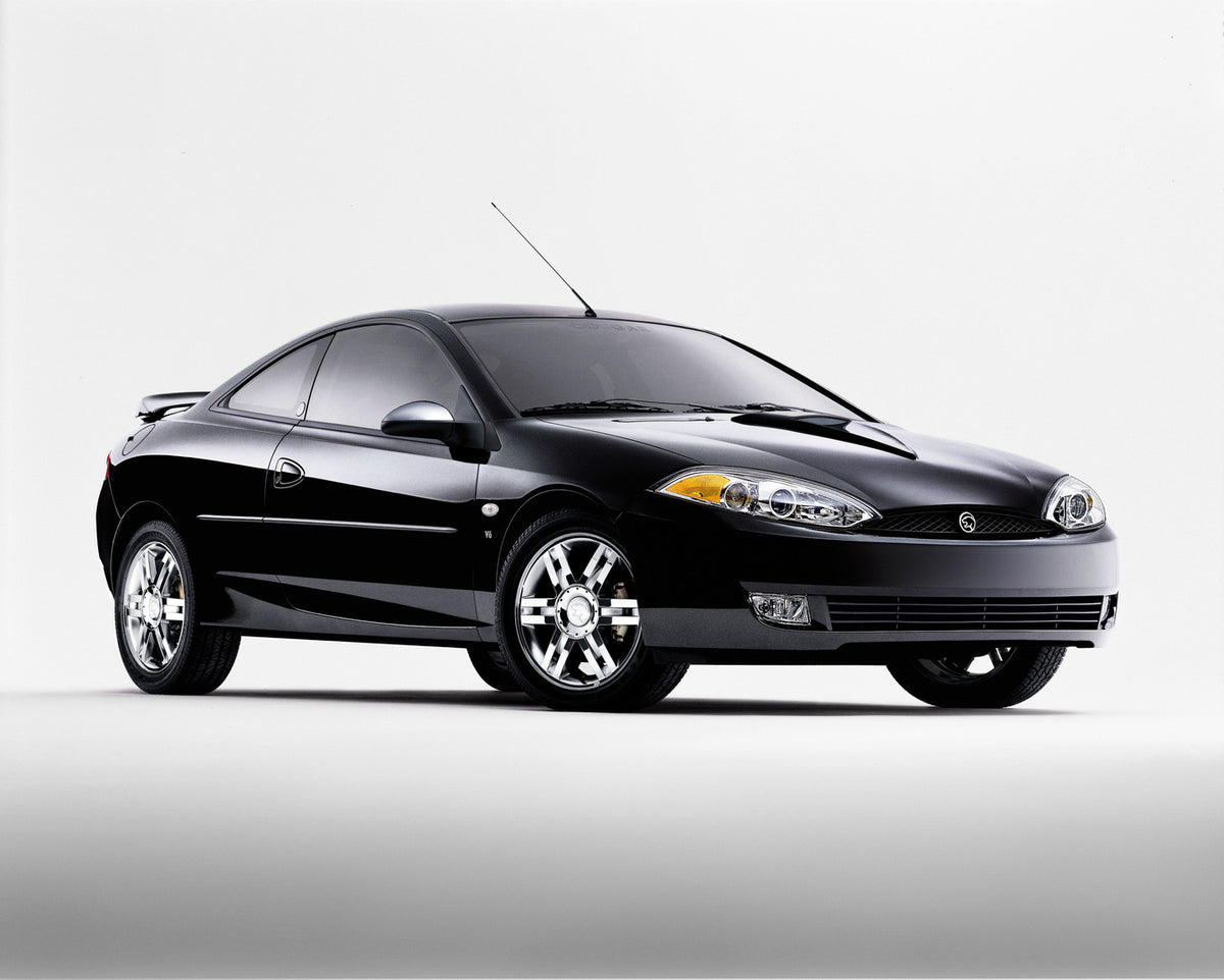 This archival image documents the 2002 Mercury Cougar with White Background and is preserved in the Ford Heritage Vault as part of Ford Motor Company's historic photographic archive. Free for personal, non-commercial use. Ford Heritage Vault refer...