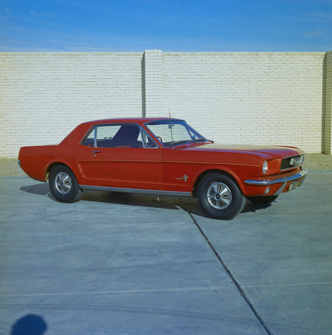 This archival image documents the 1964 Ford Mustang Hardtop Driver Side Front End View in Driveway FAP-2011-3 and is preserved in the Ford Heritage Vault as part of Ford Motor Company's historic photographic archive. Free for personal, non-commerc...