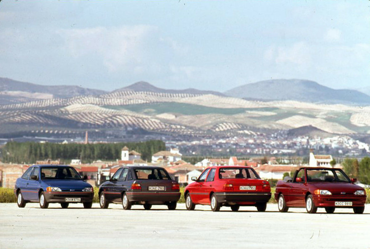 This archival image documents the 1990 Ford Escort CE-14 LHD lineup in Spain and is preserved in the Ford Heritage Vault as part of Ford Motor Company's historic photographic archive. Free for personal, non-commercial use. Ford Heritage Vault refe...