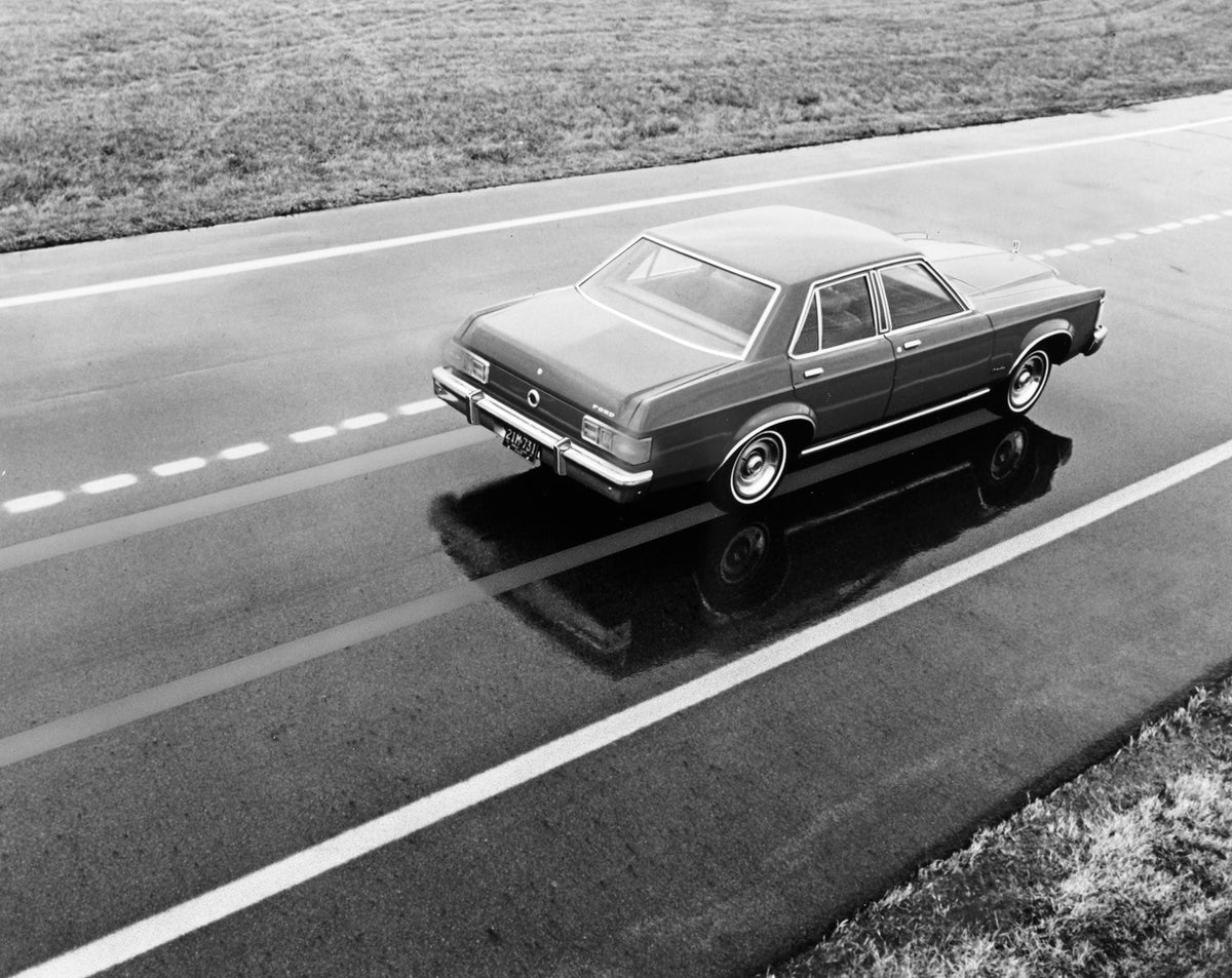 This archival image documents the 1975 Ford Granada four-door and is preserved in the Ford Heritage Vault as part of Ford Motor Company's historic photographic archive. Free for personal, non-commercial use. Ford Heritage Vault reference AR-2001-7...