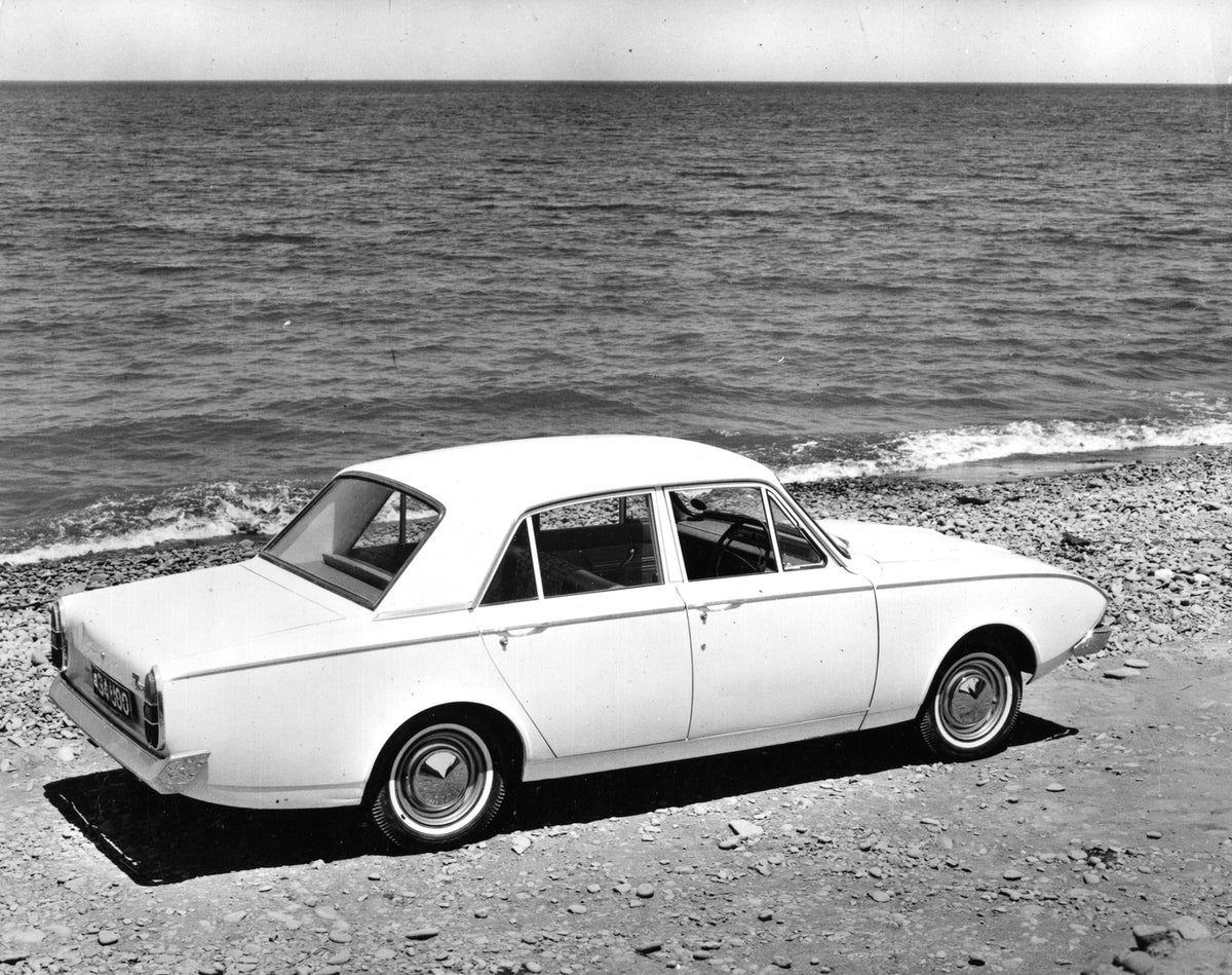 This archival image documents the 1963 Ford Consul Corsair rear view on scenic beach AR-2007-5-134b and is preserved in the Ford Heritage Vault as part of Ford Motor Company's historic photographic archive. Free for personal, non-commercial use. F...