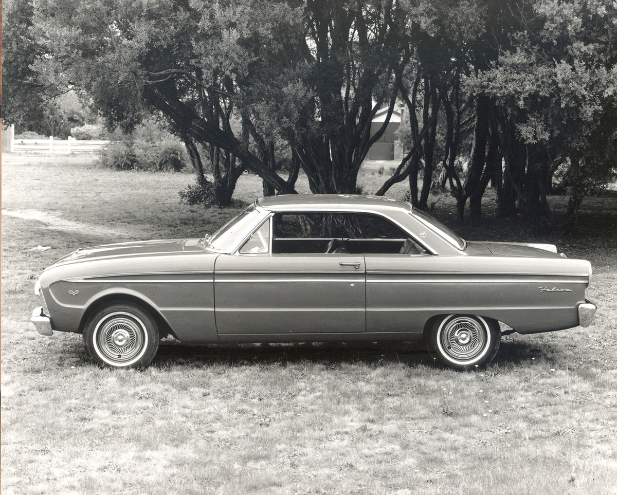 This archival image documents the 1964 Ford XM Falcon 2 Door Hardtop side view with scenic trees and is preserved in the Ford Heritage Vault as part of Ford Motor Company's historic photographic archive. Free for personal, non-commercial use. Ford...