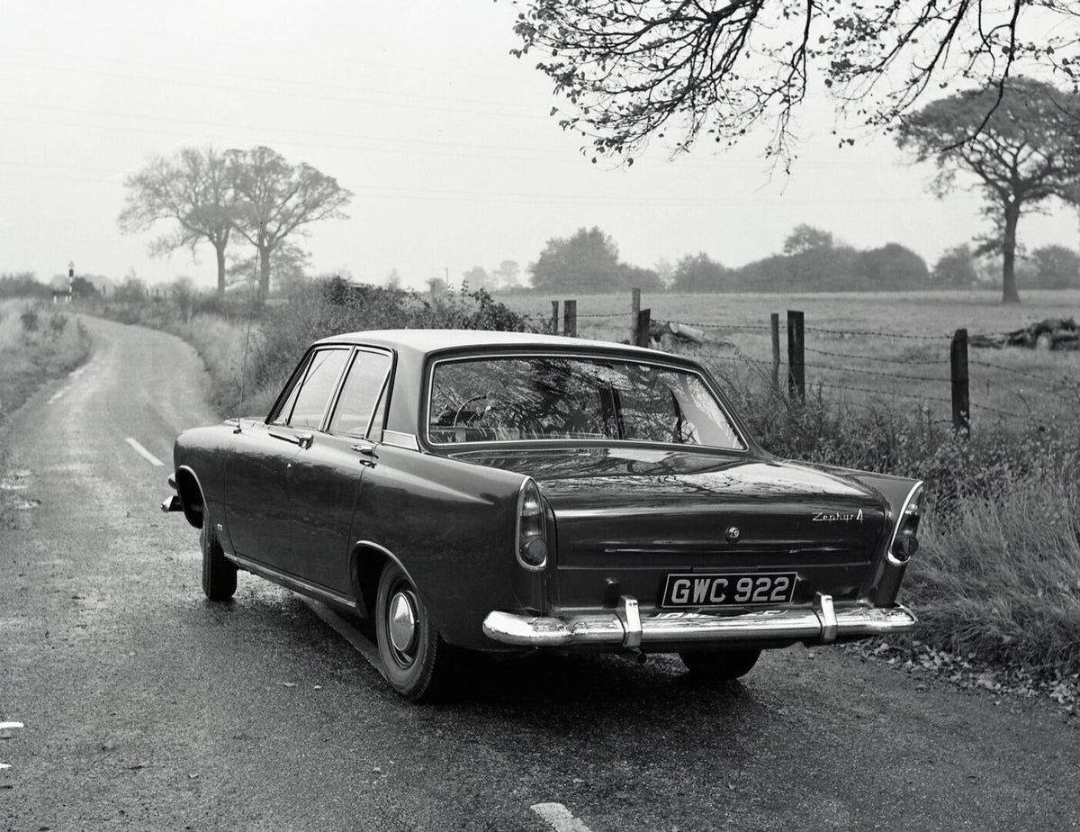 This archival image documents the 1962 Ford Zephyr 5 Mark III rear view on scenic road with trees in Aveley and is preserved in the Ford Heritage Vault as part of Ford Motor Company's historic photographic archive. Free for personal, non-commercia...