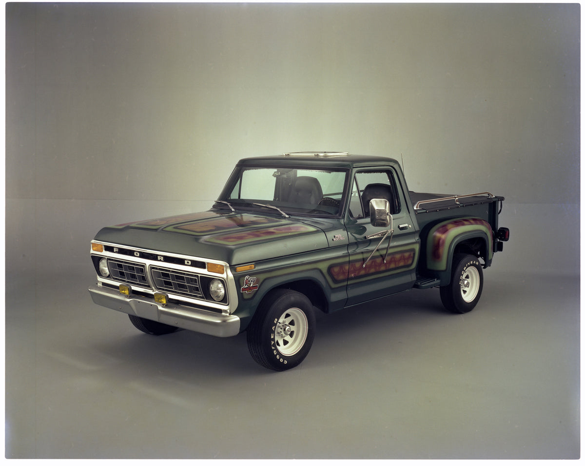 This archival image documents the 1977 Ford F-100 Flairside pickup with custom Trail Boss paint work and is preserved in the Ford Heritage Vault as part of Ford Motor Company's historic photographic archive. Free for personal, non-commercial use. ...