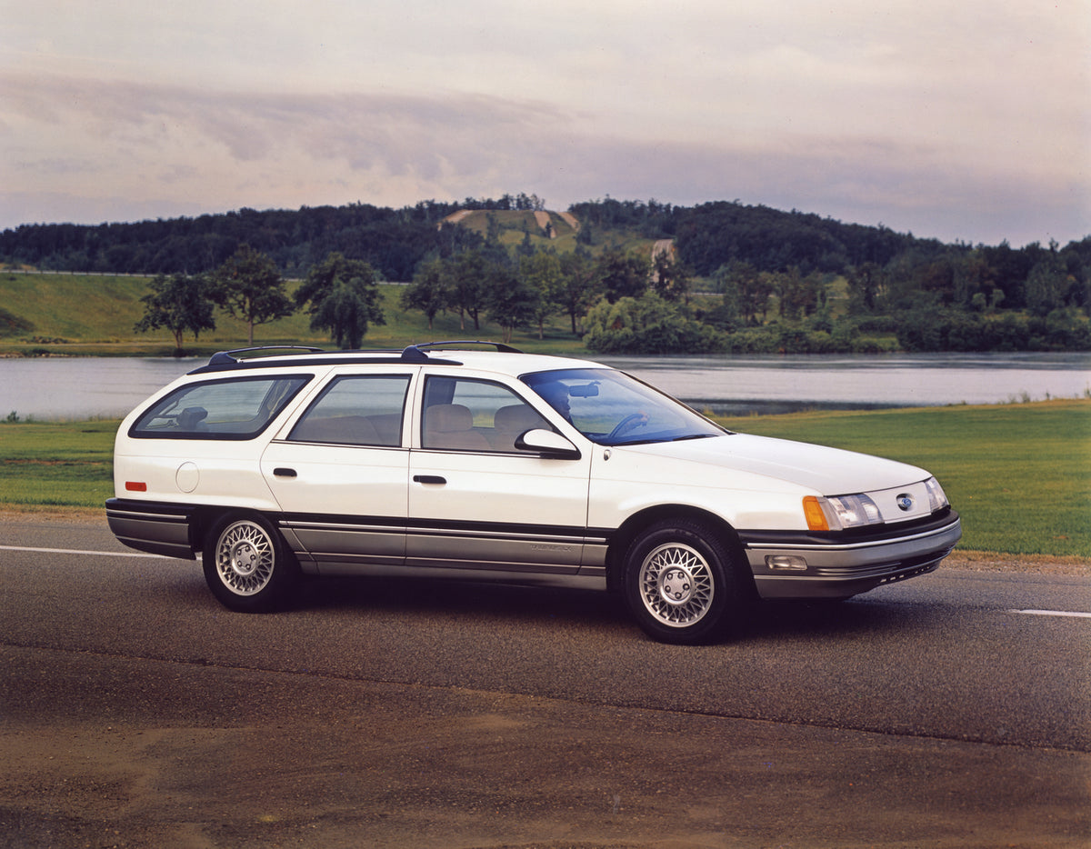 This archival image documents the 1988 Ford Taurus LX station wagon and is preserved in the Ford Heritage Vault as part of Ford Motor Company's historic photographic archive. Free for personal, non-commercial use. Ford Heritage Vault reference AR-...