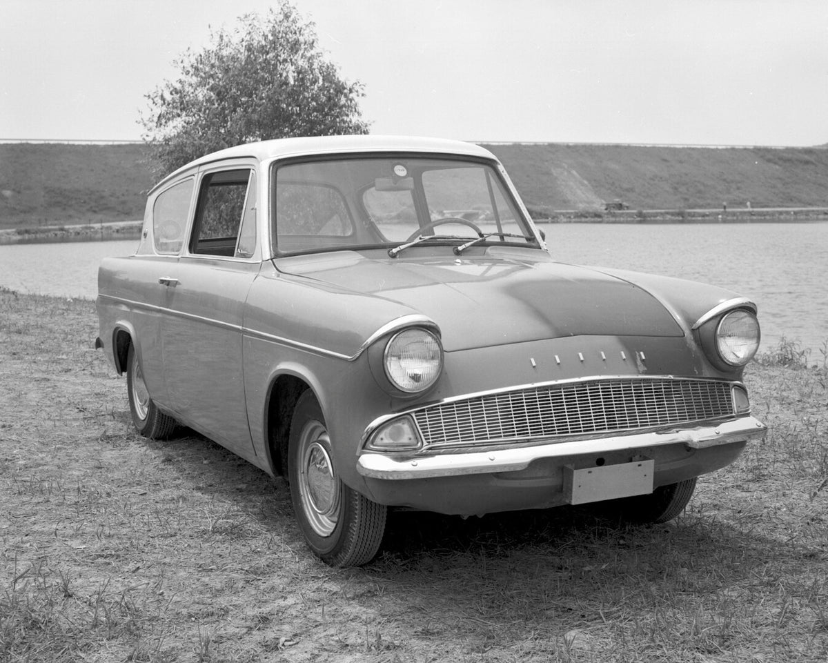 This archival image documents the 1960 Ford Anglia closeup near scenic lake (115267-25) and is preserved in the Ford Heritage Vault as part of Ford Motor Company's historic photographic archive. Free for personal, non-commercial use. Ford Heritage...