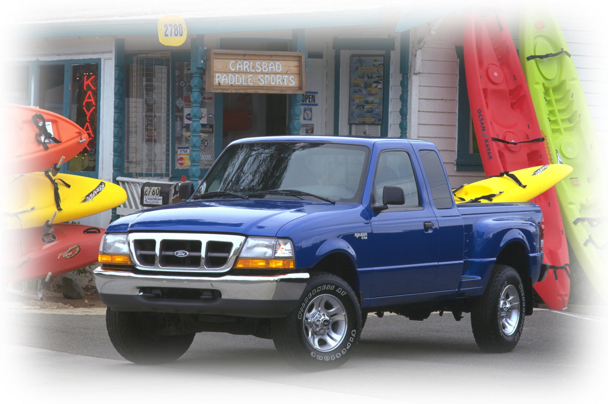 This archival image documents the 2000 Ford Ranger at Carlsbad Paddle Sports and is preserved in the Ford Heritage Vault as part of Ford Motor Company's historic photographic archive. Free for personal, non-commercial use. Ford Heritage Vault refe...