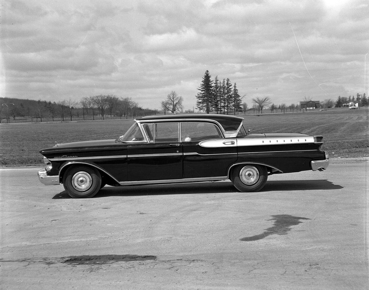 This archival image documents the 1957 Monarch Sedan side view on scenic road with field AR-2007-5 and is preserved in the Ford Heritage Vault as part of Ford Motor Company's historic photographic archive. Free for personal, non-commercial use. Fo...