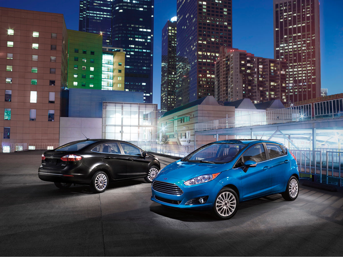 This archival image documents the 2015 Ford Fiesta in city at night with Fiesta sedan and is preserved in the Ford Heritage Vault as part of Ford Motor Company's historic photographic archive. Free for personal, non-commercial use. Ford Heritage V...