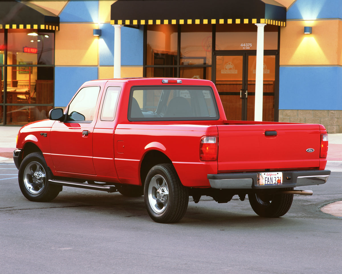 This archival image documents the 2003 Ford Ranger XLT Super Cab pickup truck and is preserved in the Ford Heritage Vault as part of Ford Motor Company's historic photographic archive. Free for personal, non-commercial use. Ford Heritage Vault ref...