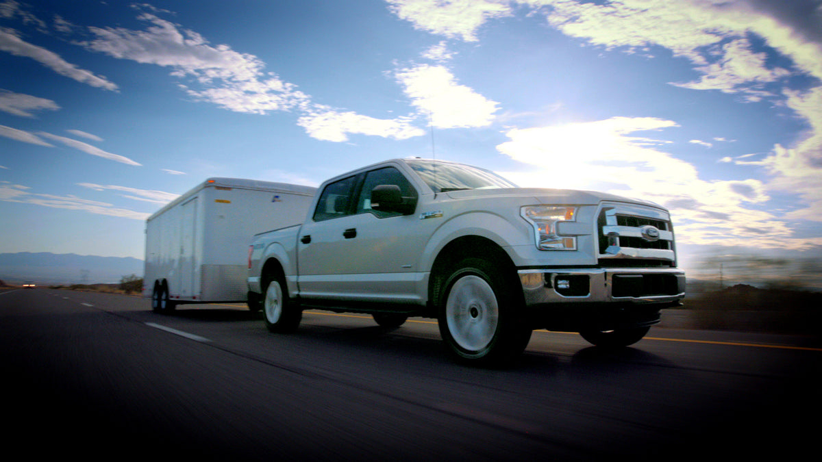 This archival image documents the 2016 Ford F-150 action shot towing trailer MS and is preserved in the Ford Heritage Vault as part of Ford Motor Company's historic photographic archive. Free for personal, non-commercial use. Ford Heritage Vault r...
