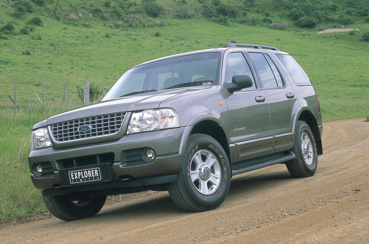 This archival image documents the 2001 Ford Explorer XLT Passenger Side Front End View on Country Road FAP-2011-3 and is preserved in the Ford Heritage Vault as part of Ford Motor Company's historic photographic archive. Free for personal, non-com...