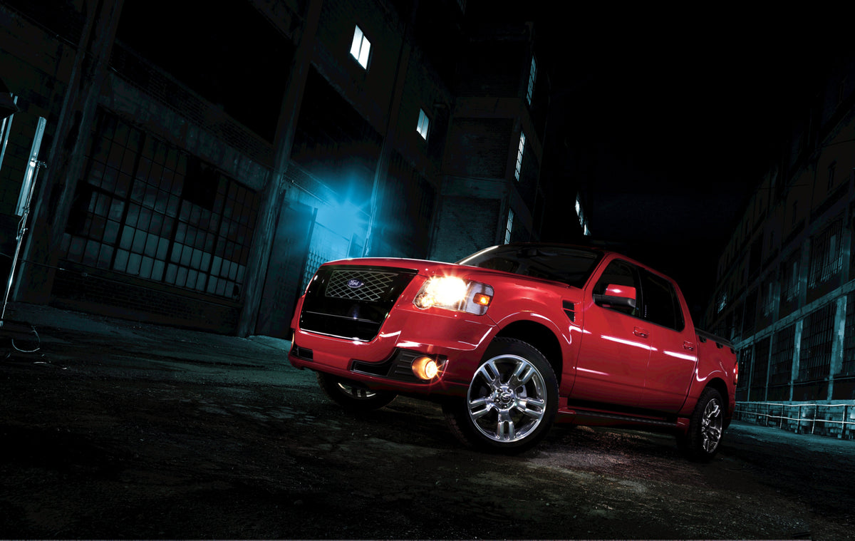 This archival image documents the 2010 Ford Explorer Sport Trac on street at night MS98897 and is preserved in the Ford Heritage Vault as part of Ford Motor Company's historic photographic archive. Free for personal, non-commercial use. Ford Herit...