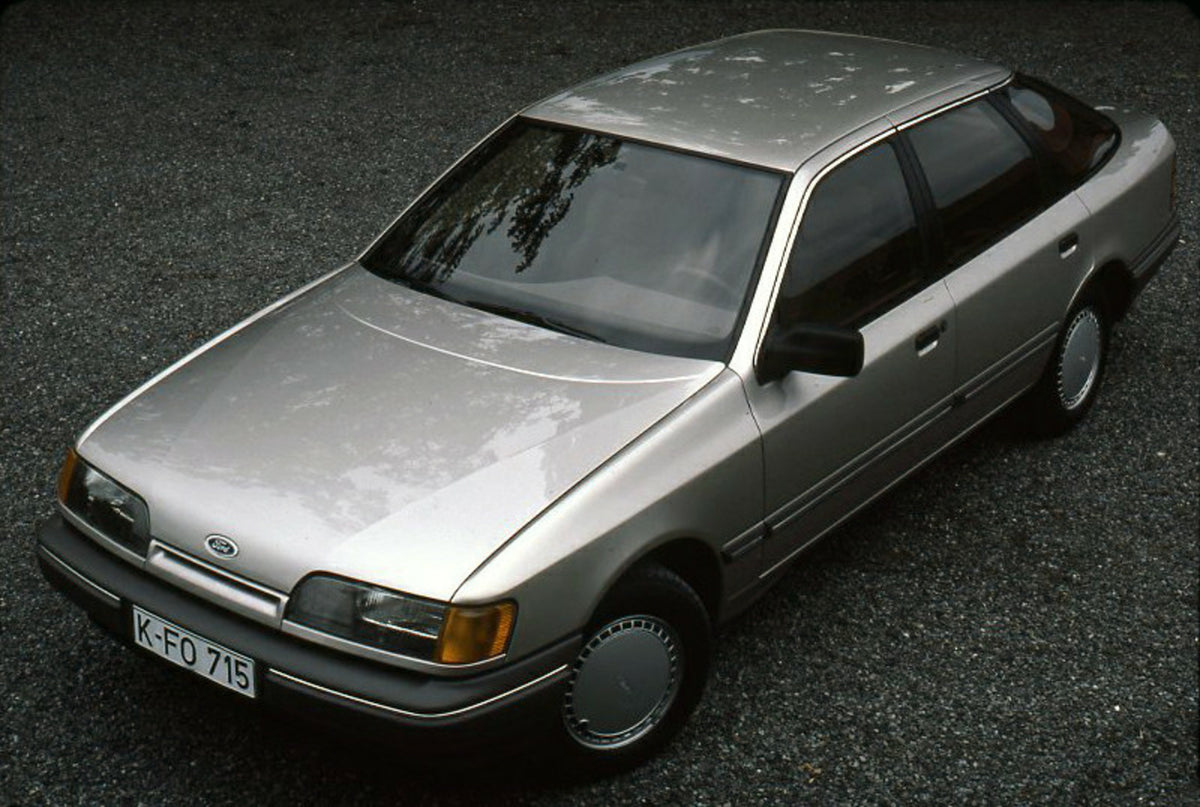This archival image documents the 1985 Ford Scorpio Mark I CL aerial view on gravel road and is preserved in the Ford Heritage Vault as part of Ford Motor Company's historic photographic archive. Free for personal, non-commercial use. Ford Heritag...